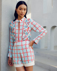 White zip shirt | Pooja Rajgarhia Gupta
